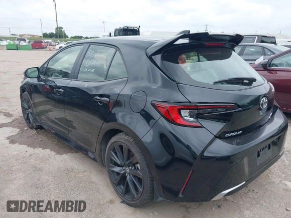 2024 Toyota Corolla Hatchback XSE with VIN JTNC4MBE4R3229869, listed as a IAAI auction lot 42128977 with 15,358 mi miles. Bid and sale history available at carsss.com. Image 3.