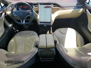 2014 Tesla Model S 60 with VIN 5YJSA1H17EFP64266, listed as a Copart auction lot 61678485 with 104,160 mi miles and Salvage title. Bid and sale history available at DreamBid. Image 8.