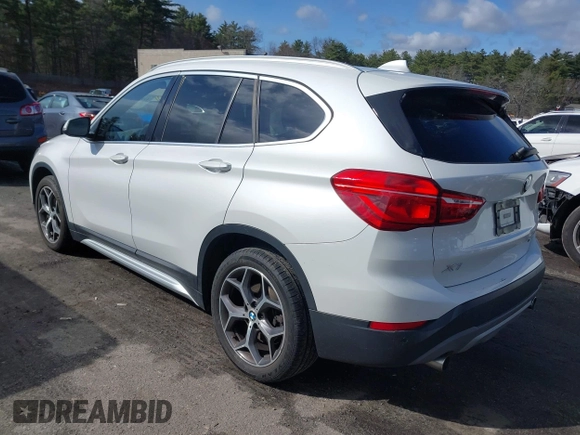 2019 BMW X1 xDrive28i with VIN WBXHT3C56K5L35842, listed as a IAAI auction lot 41981409 with 54,325 mi miles. Bid and sale history available at carsss.com. Image 3.
