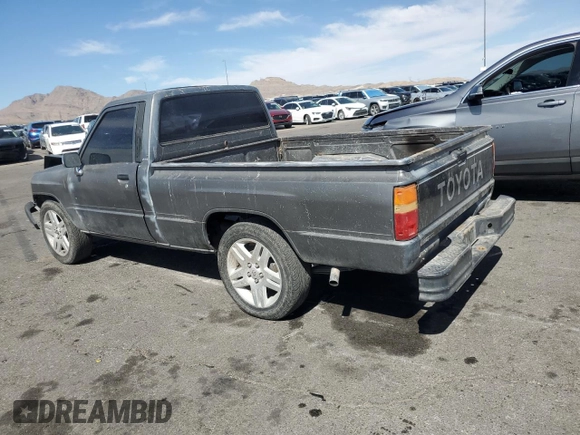1987 Toyota Pickup with VIN JT4RN50R5H0228706, listed as a Copart auction lot 50639045 with 296,043 mi miles and Salvage Title. Bid and sale history available at DreamBid. Image 2.
