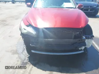 2015 Infiniti Q50 Premium with VIN JN1BV7AR2FM411095, listed as a IAAI auction lot 41932965 with 101,969 mi miles. Bid and sale history available at carsss.com. Image 6.
