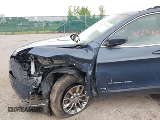 2019 Jeep Cherokee Latitude Plus with VIN 1C4PJMLB1KD465110, listed as a IAAI auction lot 42527260 with 32,579 mi miles and . Bid and sale history available at DreamBid. Image 6.