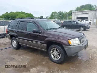 2004 Jeep Grand Cherokee Laredo z VIN 1J4GW48S94C209326, wystawiony jako IAAI lot #42309565 z przebiegiem 159 429 mil mil oraz . Historia ofert i sprzedaży dostępna na DreamBid. Obrazek 1.