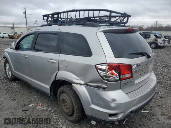 2013 Dodge Journey SXT with VIN 3C4PDDBG4DT571262, listed as a Copart auction lot 86795494 with 163,699 mi miles and Salvage title. Bid and sale history available at DreamBid. Image 2.