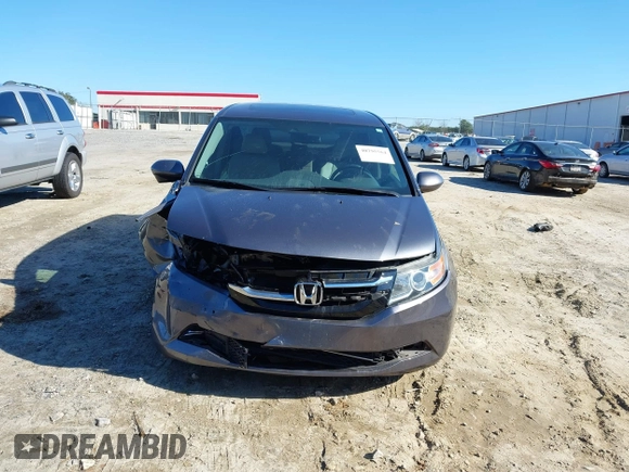 2016 Honda Odyssey EX-L with VIN 5FNRL5H69GB047902, listed as a IAAI auction lot 40795564 with 124,788 mi miles. Bid and sale history available at carsss.com. Image 12.