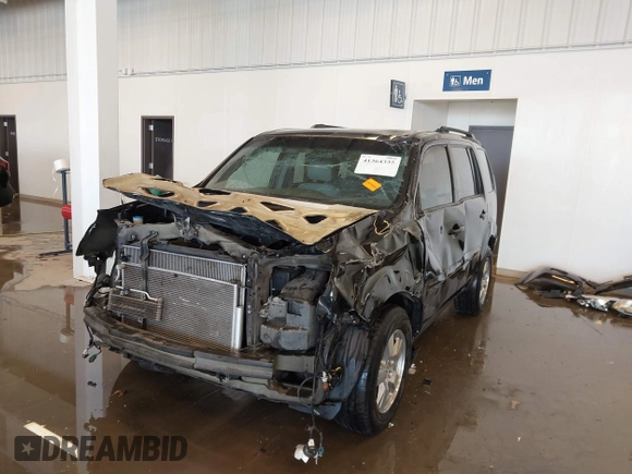2011 Honda Pilot EX with VIN 5FNYF3H48BB055911, listed as a IAAI auction lot 41364335 with 165,445 mi miles and . Bid and sale history available at carsss.com. Image 6.