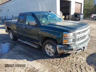 2014 Chevrolet Silverado 1500 LT with VIN 1GCVKREC5EZ370726, listed as a IAAI auction lot 41807336 with 114,102 mi miles. Bid and sale history available at carsss.com. Image 1.