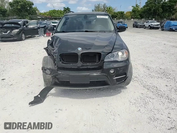 2013 BMW X5 xDrive35i z VIN 5UXZV4C58D0B21356, wystawiony jako Copart lot #54872375 z przebiegiem 113 825 mil mil oraz Szkoda całkowita • Salvage title. Historia ofert i sprzedaży dostępna na DreamBid. Obrazek 14.