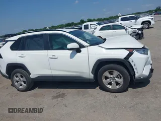 2021 Toyota RAV4 XLE with VIN JTMW1RFV2MD063839, listed as a IAAI auction lot 42406891 with 69,490 mi miles and . Bid and sale history available at DreamBid. Image 13.