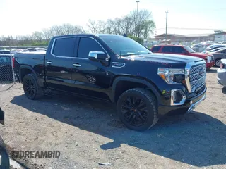 2019 GMC Sierra 1500 Denali z VIN 3GTU9FEL3KG278175, wystawiony jako IAAI lot #41931837 z przebiegiem 102 619 mil mil oraz . Historia ofert i sprzedaży dostępna na DreamBid. Obrazek 1.