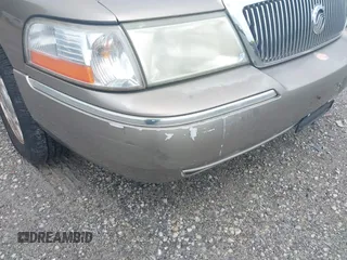 2005 Mercury Grand Marquis LS Premium z VIN 2MEFM75W25X661590, wystawiony jako IAAI lot #42534626 z przebiegiem 113 450 mil mil oraz . Historia ofert i sprzedaży dostępna na DreamBid. Obrazek 15.