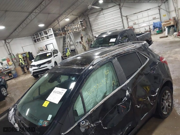 2019 Buick Encore Sport Touring with VIN KL4CJ2SBXKB881568, listed as a IAAI auction lot 41432052 with 96,775 mi miles. Bid and sale history available at carsss.com. Image 6.
