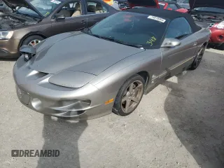 2002 Pontiac Firebird Trans Am z VIN 2G2FV32G022171702, wystawiony jako Copart lot #74819264 z przebiegiem Nie podano mil oraz Nie do naprawy • Non repairable. Historia ofert i sprzedaży dostępna na DreamBid. Obrazek 1.