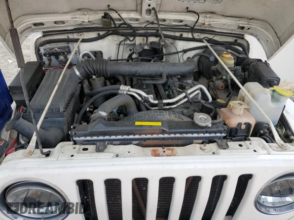 2000 Jeep Wrangler Sahara with VIN 1J4FA59SXYP760278, listed as a Copart auction lot 60402485 with 192,161 mi miles and Salvage title. Bid and sale history available at DreamBid. Image 12.