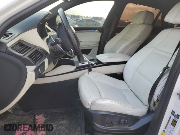 2012 BMW X6 50i z VIN 5UXFG8C59CL590549, wystawiony jako Copart lot #53071175 z przebiegiem 67 390 mil mil oraz Szkoda całkowita • Salvage title. Historia ofert i sprzedaży dostępna na DreamBid. Obrazek 7.