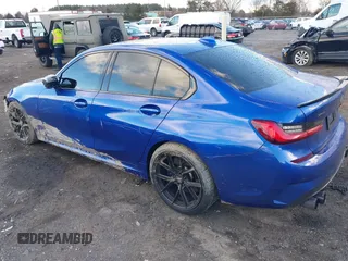 2020 BMW 3 Series M340i xDrive with VIN WBA5U9C00LFH03223, listed as a IAAI auction lot 41020498 with 58,775 mi miles and . Bid and sale history available at DreamBid. Image 3.