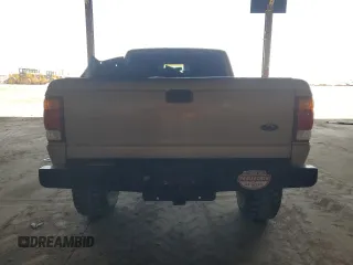 1998 Ford Ranger XL with VIN 1FTZR15X2WPB03820, listed as a Copart auction lot 60717595 with 202,801 mi miles and Salvage title. Bid and sale history available at DreamBid. Image 6.