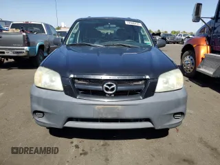 2006 Mazda Tribute i with VIN 4F2YZ02Z16KM36535, listed as a Copart auction lot 74566474 with 254,105 mi miles and Clean Title. Bid and sale history available at carsss.com. Image 5.