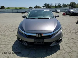 2019 Honda Clarity Touring z VIN JHMZC5F38KC007064, wystawiony jako Copart lot #55362015 z przebiegiem 74 565 mil mil oraz Szkoda całkowita • Salvage title. Historia ofert i sprzedaży dostępna na DreamBid. Obrazek 13.