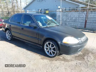 1997 Honda Civic LX with VIN 2HGEJ6670VH567081, listed as a IAAI auction lot 41995007 with 107,943 mi miles. Bid and sale history available at carsss.com. Image 1.