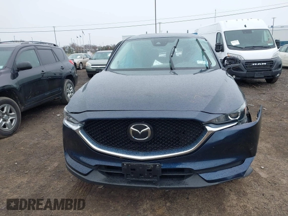 2020 Mazda CX-5 Touring with VIN JM3KFBCM9L0799502, listed as a IAAI auction lot 42007207 with 43,364 mi miles. Bid and sale history available at carsss.com. Image 11.