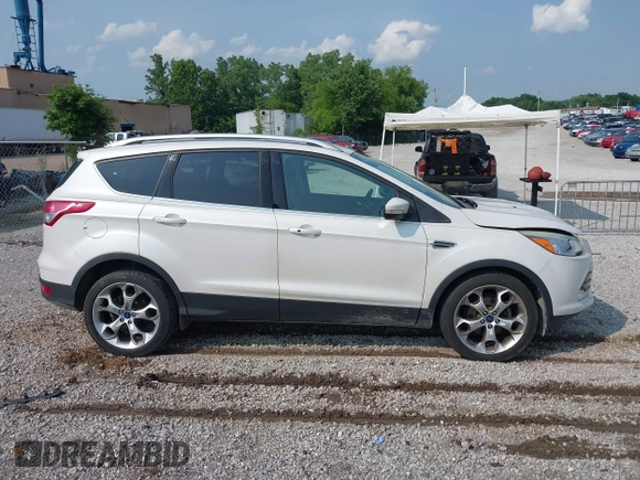2015 Ford Escape Titanium with VIN 1FMCU0JXXFUA07175, listed as a IAAI auction lot 42447067 with 94,893 mi miles and . Bid and sale history available at DreamBid. Image 13.