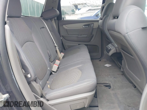 2014 Chevrolet Traverse LS z VIN 1GNKRFKD0EJ158364, wystawiony jako IAAI lot #42355074 z przebiegiem 124 449 mil mil oraz . Historia ofert i sprzedaży dostępna na DreamBid. Obrazek 8.