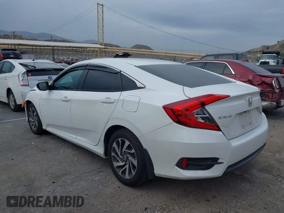 2016 Honda Civic Sedan EX with VIN 2HGFC2F70GH530459, listed as a IAAI auction lot 41710538 with 136,470 mi miles. Bid and sale history available at carsss.com. Image 3.