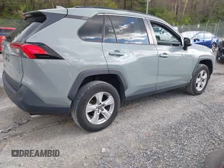 2019 Toyota RAV4 XLE with VIN 2T3P1RFV0KC014516, listed as a IAAI auction lot 41971856 with 94,447 mi miles and . Bid and sale history available at DreamBid. Image 4.