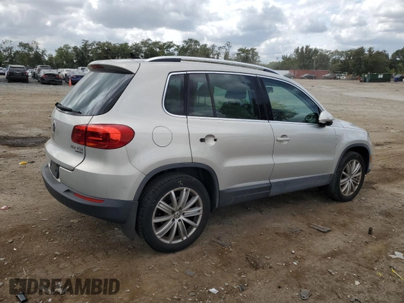 2013 Volkswagen Tiguan SE z VIN WVGBV7AX0DW539618, wystawiony jako Copart lot #71529804 z przebiegiem 148 362 mil mil oraz Szkoda całkowita • Salvage title. Historia ofert i sprzedaży dostępna na DreamBid. Obrazek 3.
