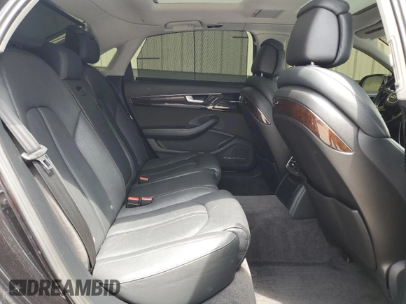 2015 Audi A8 4.0T z VIN WAU32AFD8FN001493, wystawiony jako Copart lot #57394315 z przebiegiem 120 464 mil mil oraz Szkoda całkowita • Salvage title. Historia ofert i sprzedaży dostępna na DreamBid. Obrazek 10.