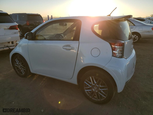 2015 Scion iQ with VIN JTNJJXB09FJ030846, listed as a Copart auction lot 88353405 with 72,208 mi miles and Salvage Title. Bid and sale history available at carsss.com. Image 2.