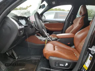 2020 BMW X3 M Competition z VIN 5YMTS0C07L9B67663, wystawiony jako Copart lot #70009763 z przebiegiem 18 645 mil mil oraz . Historia ofert i sprzedaży dostępna na DreamBid. Obrazek 7.