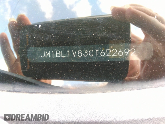 2012 Mazda 3 i Touring z VIN JM1BL1V83C1622692, wystawiony jako IAAI lot #42447571 z przebiegiem 136 065 mil mil oraz . Historia ofert i sprzedaży dostępna na DreamBid. Obrazek 9.