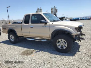 1999 Toyota Tacoma PreRunner with VIN 4TASN92N7XZ573079, listed as a Copart auction lot 56917035 with 254,939 mi miles and Salvage title. Bid and sale history available at DreamBid. Image 4.
