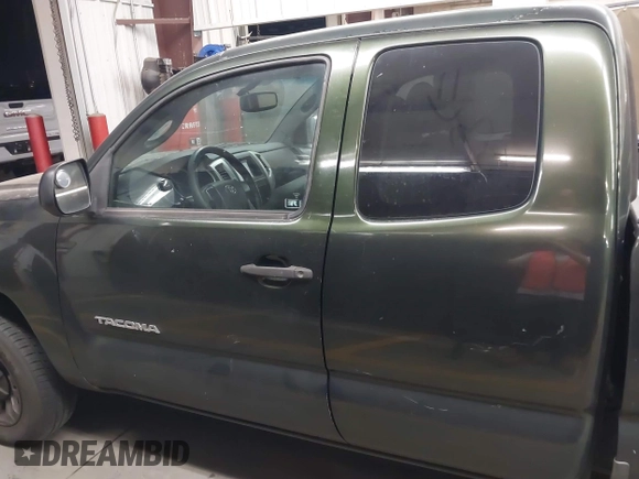 2012 Toyota Tacoma with VIN 5TFTX4CNXCX018590, listed as a IAAI auction lot 42106165 with 110,378 mi miles and . Bid and sale history available at DreamBid. Image 14.