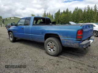 2000 Dodge 2500 z VIN 3B7KC2360YG146577, wystawiony jako Copart lot #57868995 z przebiegiem 360 637 mil mil oraz Tytuł czysty. Historia ofert i sprzedaży dostępna na DreamBid. Obrazek 2.