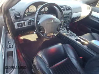 2004 Ford Thunderbird Deluxe with VIN 1FAHP60A94Y105675, listed as a Copart auction lot 87677015 with 91,154 mi miles and Salvage Title. Bid and sale history available at DreamBid. Image 8.