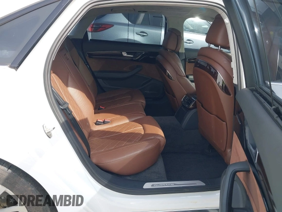 2015 Audi A8 4.0T with VIN WAU32AFD6FN039739, listed as a IAAI auction lot 41946401 with 102,668 mi miles and . Bid and sale history available at DreamBid. Image 8.