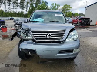 2003 Lexus GX 470 z VIN JTJBT20X030017116, wystawiony jako Copart lot #52620705 z przebiegiem 240 434 mil mil oraz Szkoda całkowita • Salvage title. Historia ofert i sprzedaży dostępna na DreamBid. Obrazek 5.