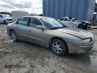 2001 Oldsmobile Aurora z VIN 1G3GR64H914122292, wystawiony jako Copart lot #75867154 z przebiegiem 120 977 mil mil oraz Szkody całkowita. Historia ofert i sprzedaży dostępna na DreamBid. Obrazek 4.