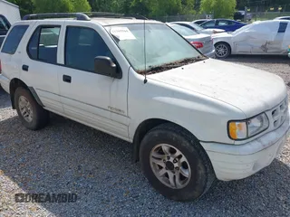 2002 Isuzu Rodeo S with VIN 4S2CK58W024313661, listed as a IAAI auction lot 42305564 with 174,949 mi miles and . Bid and sale history available at DreamBid. Image 1.