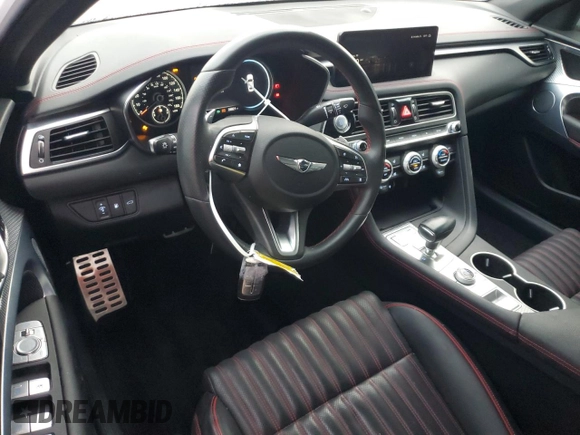 2023 Genesis G70 2.0T with VIN KMTG34TA4PU104576, listed as a Copart auction lot 85082044 with 28,821 mi miles and Salvage Title. Bid and sale history available at DreamBid. Image 8.