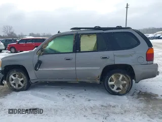 2007 GMC Envoy SLE with VIN 1GKDT13S072246688, listed as a IAAI auction lot 41258265 with 218,001 mi miles. Bid and sale history available at carsss.com. Image 14.
