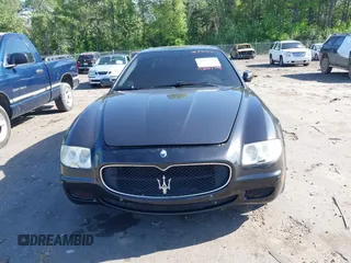 2007 Maserati Quattroporte with VIN ZAMFE39A070029397, listed as a IAAI auction lot 42027798 with 95,978 mi miles. Bid and sale history available at carsss.com. Image 6.