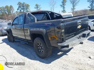 2014 Chevrolet Silverado 1500 LT with VIN 1GCVKREH3EZ320659, listed as a IAAI auction lot 41665352 with 105,574 mi miles and . Bid and sale history available at DreamBid. Image 3.