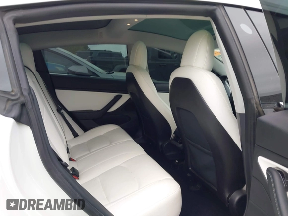 2020 Tesla Model 3 Long Range with VIN 5YJ3E1EB0LF703733, listed as a IAAI auction lot 41796732 with 75,027 mi miles. Bid and sale history available at carsss.com. Image 8.