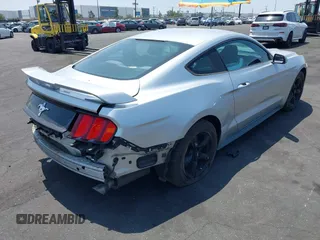 2015 Ford Mustang V6 with VIN 1FA6P8AM1F5342967, listed as a IAAI auction lot 42164817 with 106,700 mi miles and . Bid and sale history available at DreamBid. Image 4.