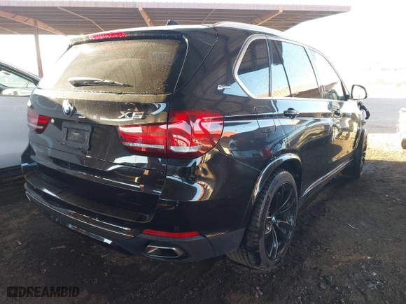 2017 BMW X5 xDrive40e iPerformance with VIN 5UXKT0C35H0V97078, listed as a IAAI auction lot 41601844 with 85,597 mi miles. Bid and sale history available at carsss.com. Image 4.