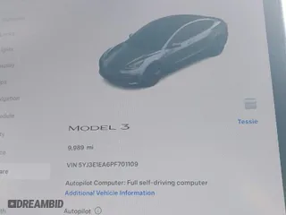 2023 Tesla Model 3 with VIN 5YJ3E1EA6PF701109, listed as a IAAI auction lot 40491628 with 9,989 mi miles. Bid and sale history available at carsss.com. Image 7.